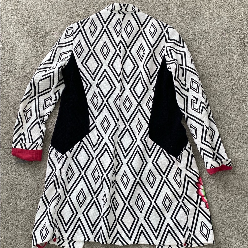 Black and white jacket with flower detail
